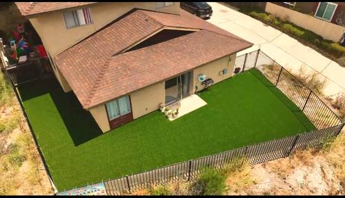 Drone shot of complete turf and fencing install